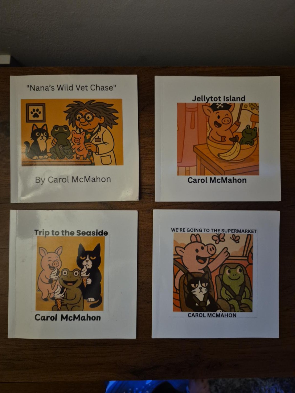Four original Pocket Mayhem family photo books: Nana’s Wild Vet Chase, Jellytot Island, Trip to the Seaside and We’re Going to the Supermarket.